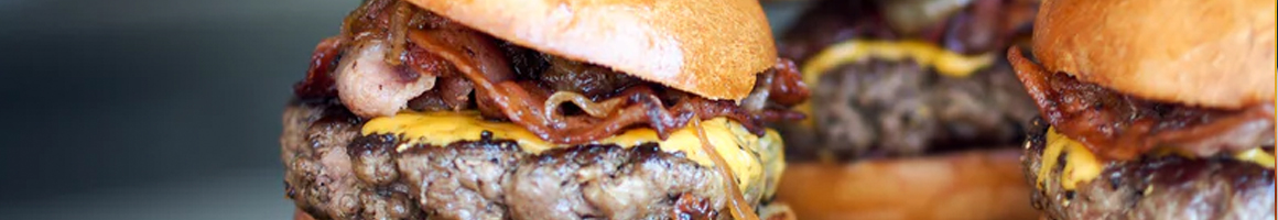 Eating Burger Fast Food at Storm's Drive-in Burnet restaurant in Burnet, TX.